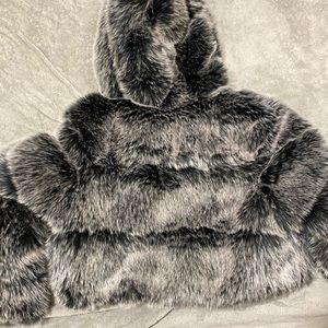 QIYE brand cropped fur jacket, Grey, white, and black color.